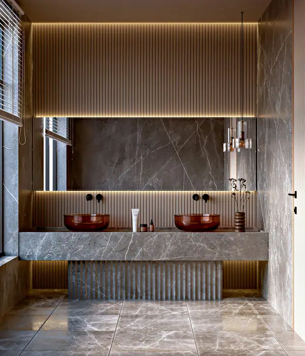 Koyu gri mermer banyo tezgahı ve çift lavabo